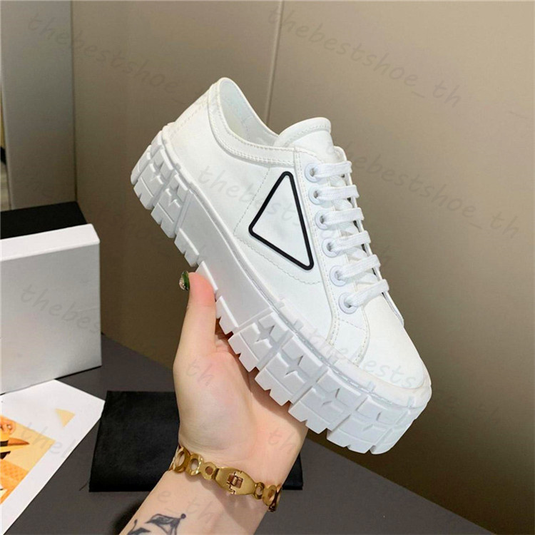 Designer casual skor gabardine nylon sneakers kvinnor modemärke hjul tränare lyx canvas sneakers mångsidiga fasta färgplattformskor