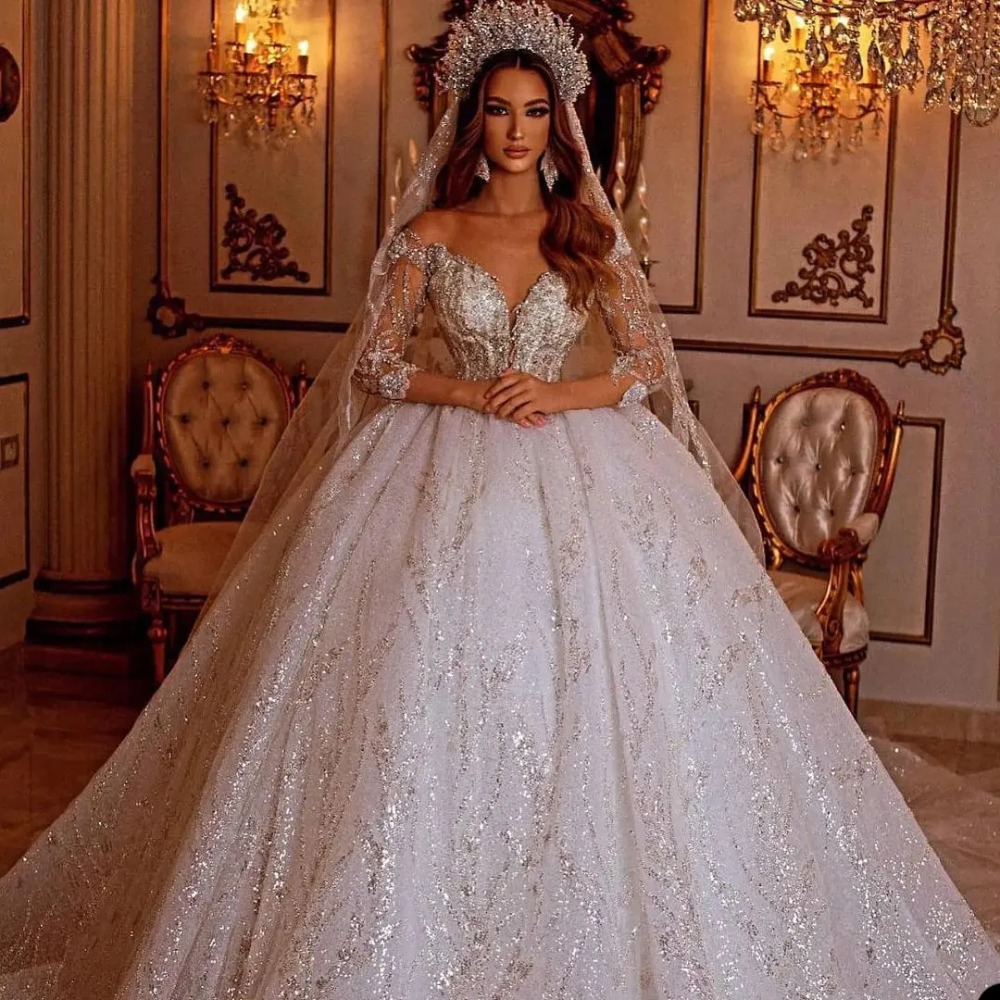 Atemberaubende 2024 Saudi-Arabien Prinzessin Ballkleid Hochzeitskleid Sheer Off Shoulder Langarm Luxus Spitze Pailletten Applikationen Brautkleider Kristallbrautkleider