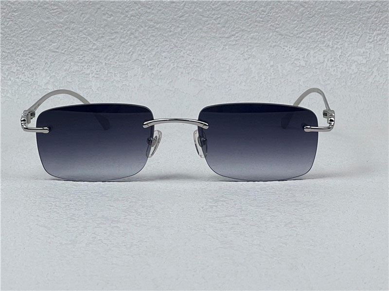 Venta al por mayor gafas de sol 5634295 ultraligeras cuadradas sin marco patillas de metal animal diseño retro vanguardista gafas de colores claros uv400