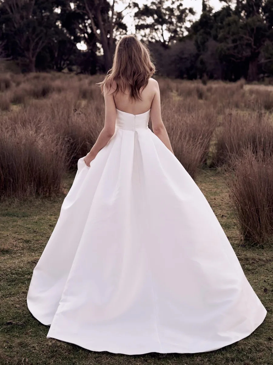 Seksowne sukienki ślubne A-line bez rąk bez ramięci w szczelinie BEZPIECZEŃSTWA PLATED SATYNA SUNTY BRIDAL STRIBT TRACT 2024 Summer Garden Beach Long Bride Wear