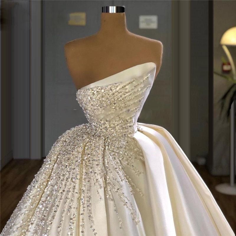 2024 Luxury A Line Wedding Dresses Dubai Arabic Strapless Sexy Satin Sleeveless Silver Crystal Beading Bridal Gowns Chapel Train