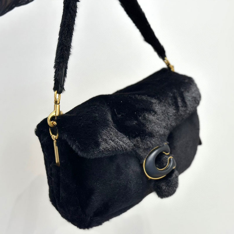 Modedesigner väska den nya fuzzy mjuka atmosfären är fylld med en varm 25 cm underarmspåse handhållen crossbody väska