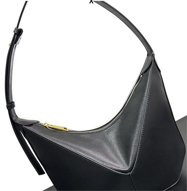 2024 Nieuw kalfsleer high-end en niche-ontwerp voor dameshandtassen, draagbare crossbody onderarmtas met enkele schouder, leren tas designer zwart