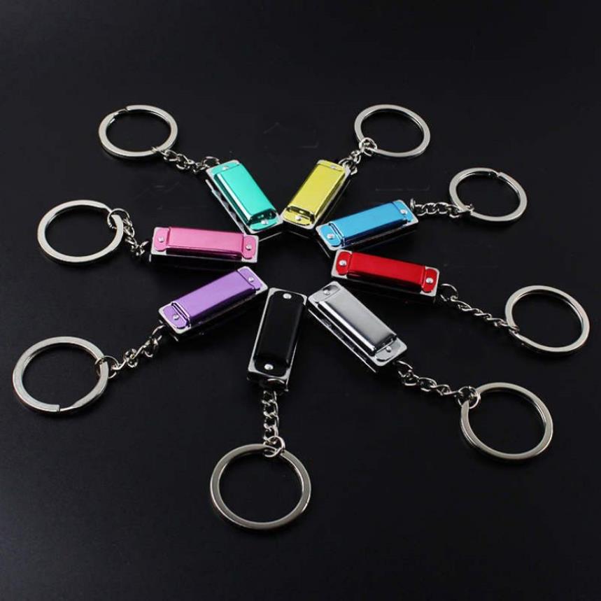 100st Mot Metal 4 Holes Mini Munnonica Keychain Children Toy's Keyring Kid's Gifts Key Chain Bags Mobile Key Rings210r