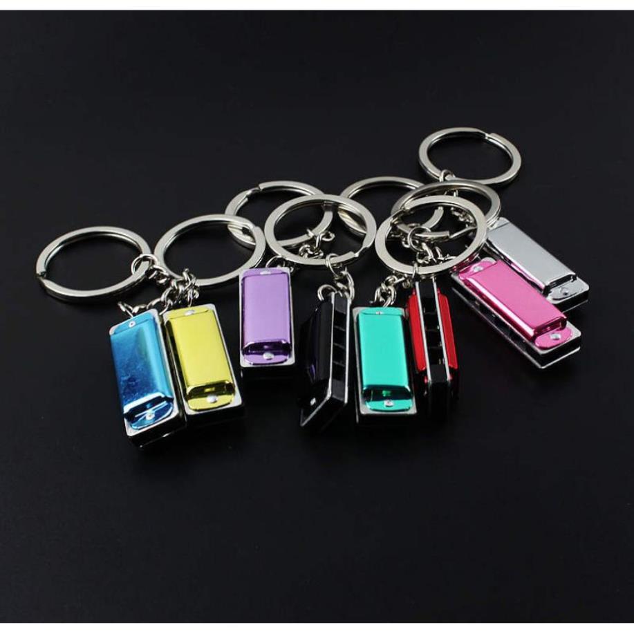 100st Mot Metal 4 Holes Mini Munnonica Keychain Children Toy's Keyring Kid's Gifts Key Chain Bags Mobile Key Rings210r