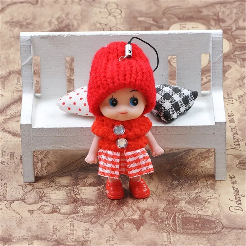 2024 8CM Clown Mobile Phone Pendant Plaid Skirt Knitted Hat Lovely Doll Mini Girls Ornaments Toys Gift Dolls Originality 0 6yg F2