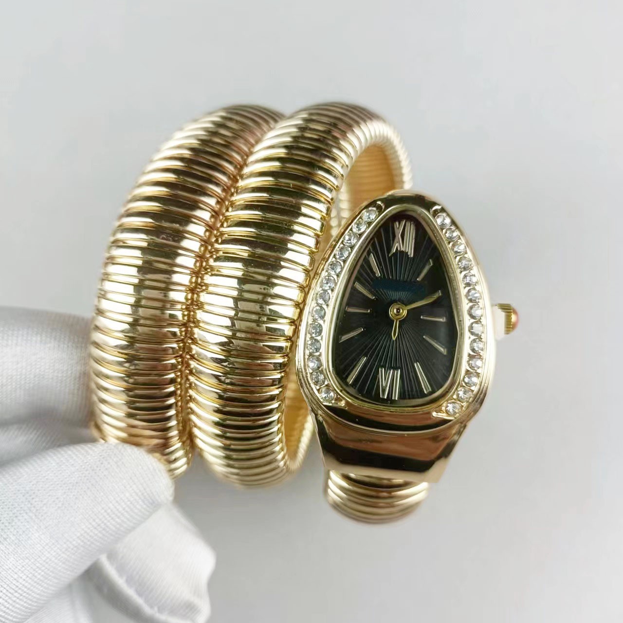 Slangvormig dameshorloge met twee ringen, stalen band en diamanten ingelegd, klassiek quartzhorloge