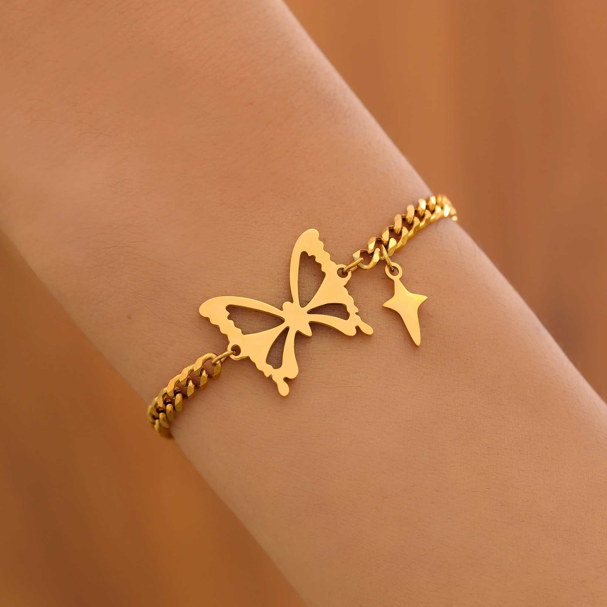 Beaded Stainless Steel Armband Elegant utsökta ihåliga fjäril Pendant Charmkedjor Fashion Armband för kvinnliga smycken bästa gåvor