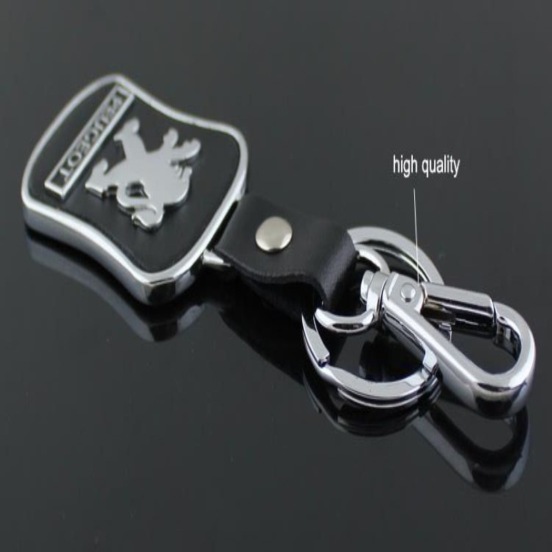 ロットトップファッションカーロゴプジョーメタルレザーキーリングキーリングキーリングリングllaveros Chaveiro Car Emblem Key Holder250