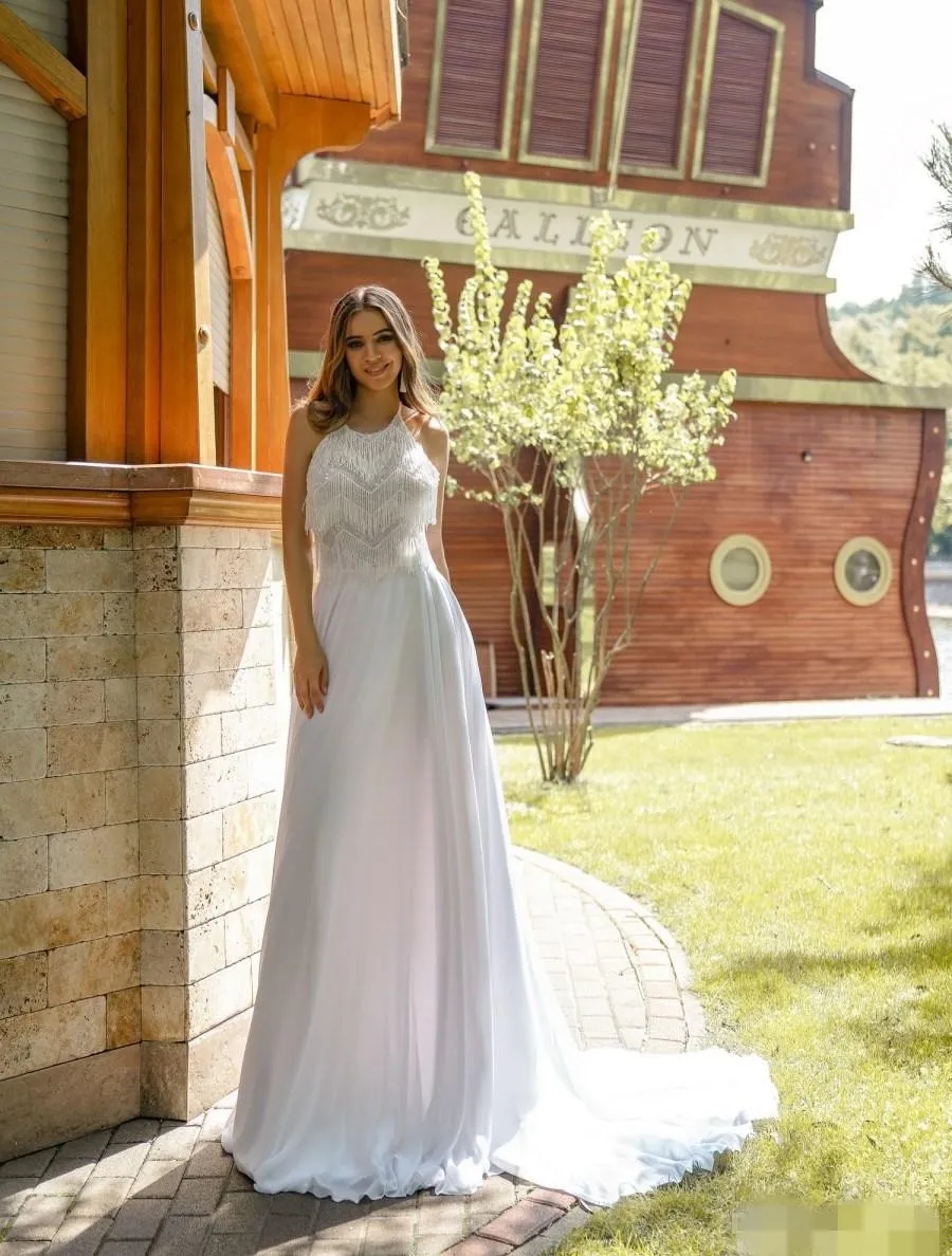 2024 Sexy rückenfreie Brautkleider Halter Quasten Chiffon Sweep Zug Perlen nach Maß Strand Hochzeit Brautkleid Vestido de Novia YD