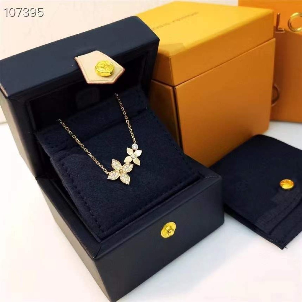 Joyería de diseño Collares Colgante Charm Flor Oro Amor V Collar Mujeres Anillos Pulsera Brazaletes Colgantes de lujo amantes cadena Hea327Y