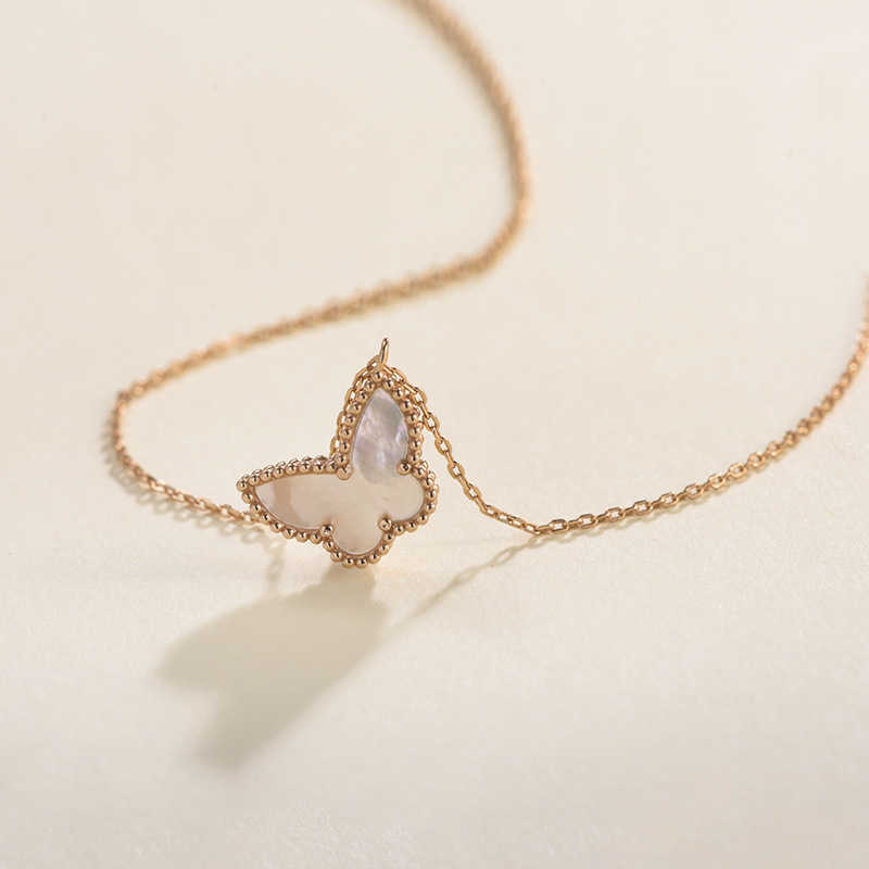 vネックレス蝶のネックレス新しいシンプルな気質白い貝の母と娘の夏の甘いデザインネットレッドスイートコラーボーンチェーンネックチェーン552