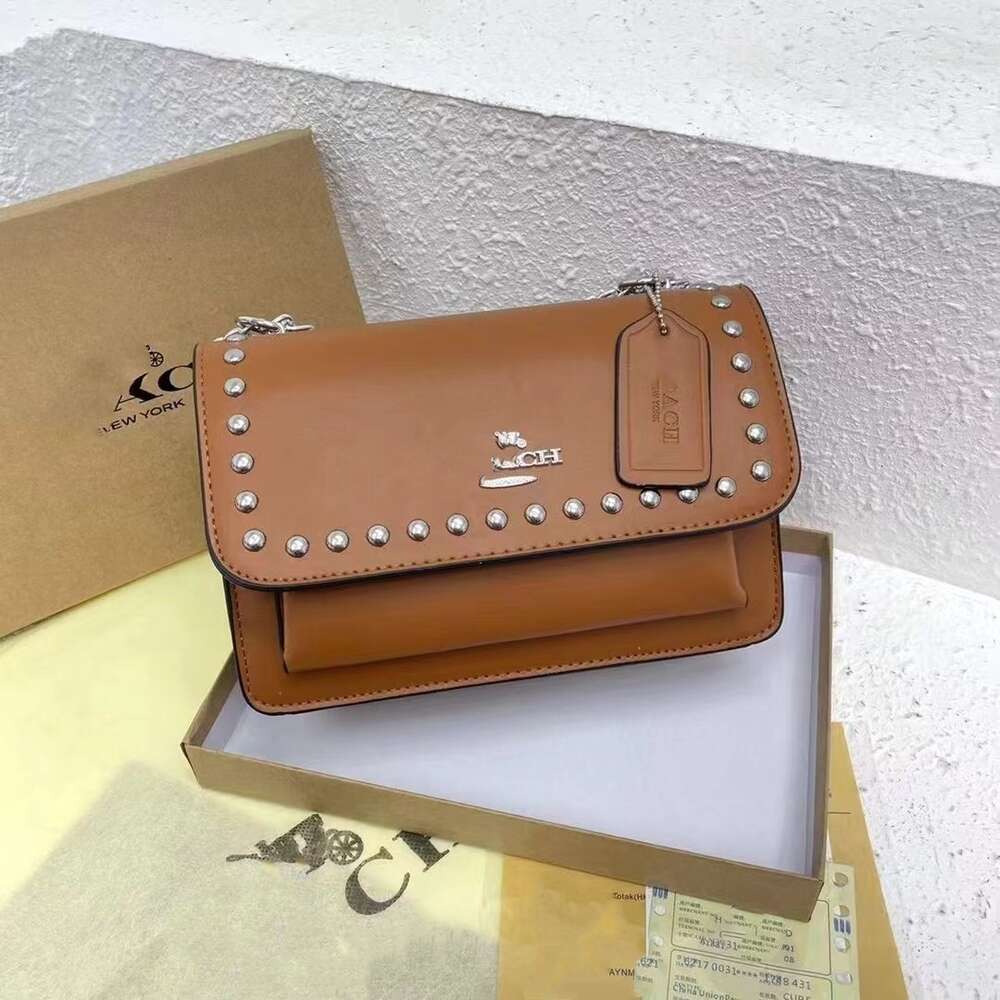 Factory Wholesale and Retail New Handbag New High Quality Fashion Single Shoulder Diagonal Straddle Bag Chain Rivet Appearance Womens Underarm Small Square