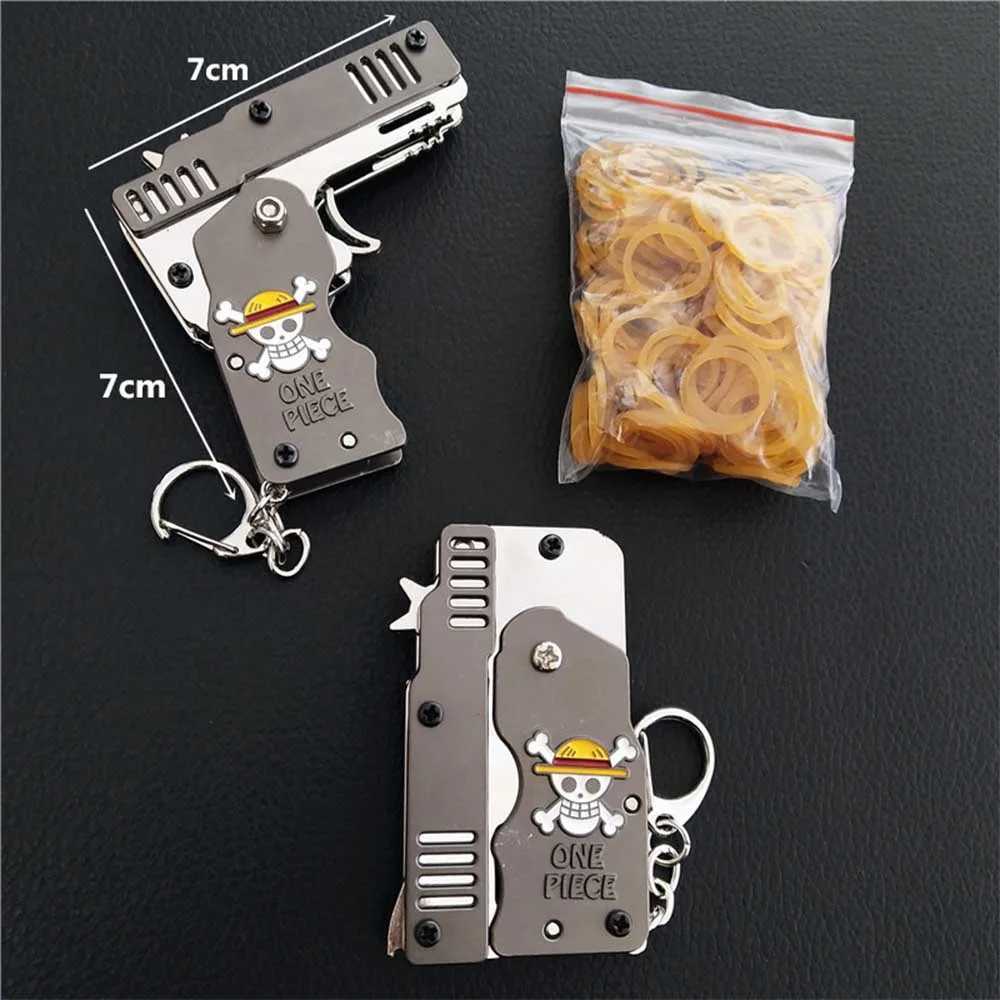 Pistola juguetes llavero pistolas de juguete de goma pistola de Metal plegable regalos Mini pistola 240307