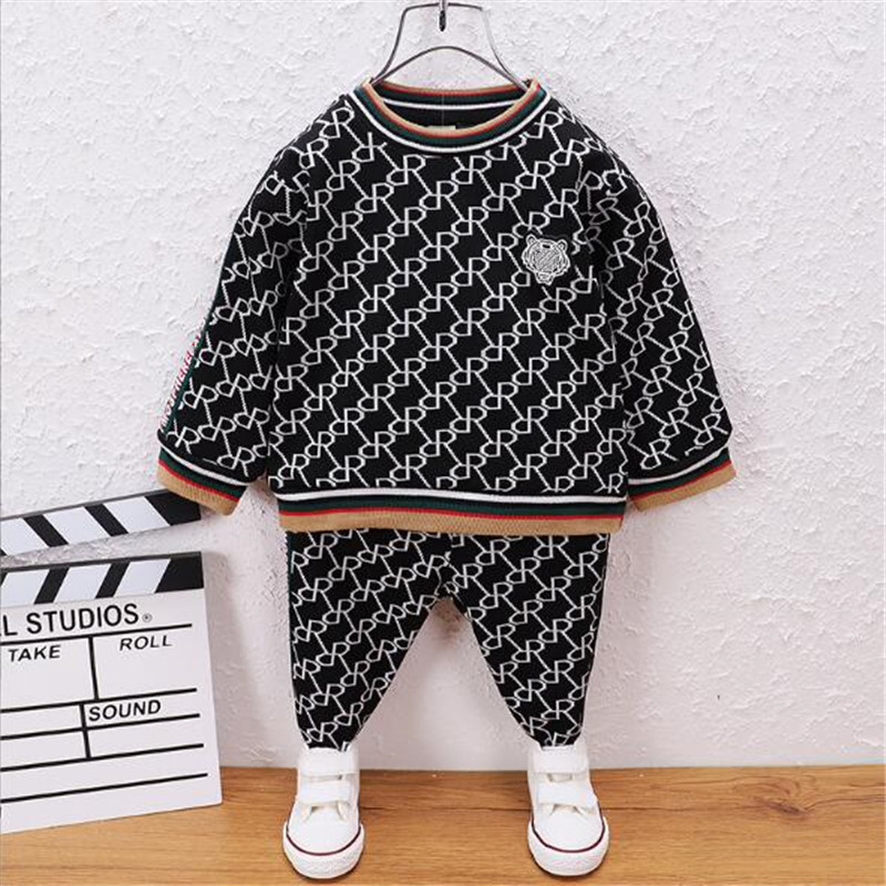 Baby kinderkleding 2024 nieuwe lente kinderpak jongens en meisjes ronde hals gekleurd full body print trui lange mouw trendy tweedelige kledingsets