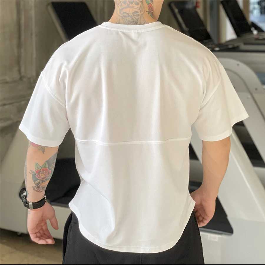 T-shirt da uomo 2021 Mens Muscle T Shirt Bodybuilding Fitness Uomo Top Canotte in cotone Plus Maglietta di grandi dimensioni Maglia di cotone Manica corta allentata