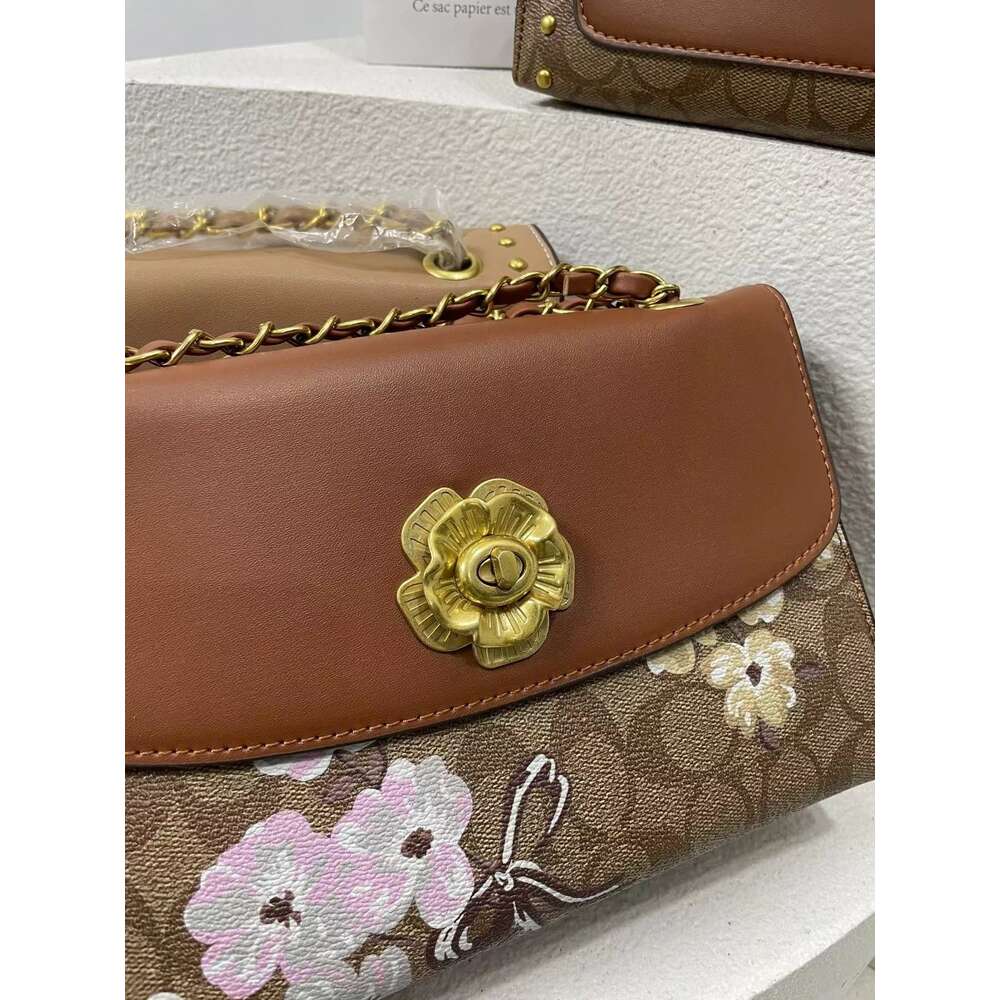 Sac de créateur usine en ligne vente en gros au détail style moyen printemps nouveau rivet camélia sac pour femme sentiment vieille fleur chaîne sous les bras épaule unique