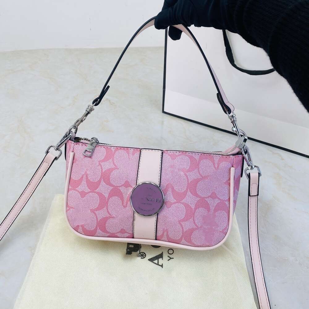 Billiga grossistdesignerhandväskor Hong Kong Lonnie Macaron Old Flower New Trendy Luxury Law Stick Underarm Single Shoulder Crossbody Bag Mahjong