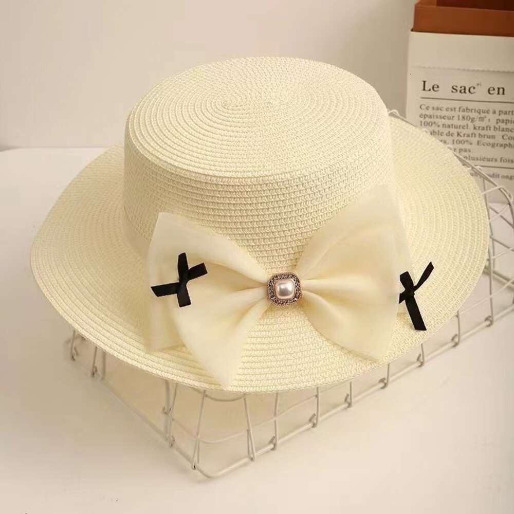 Chapeaux à large bord Chapeau de paille femmes parasol chapeau de paille style coréen perle arc plage vacances décontracté plage chapeau de protection solaire