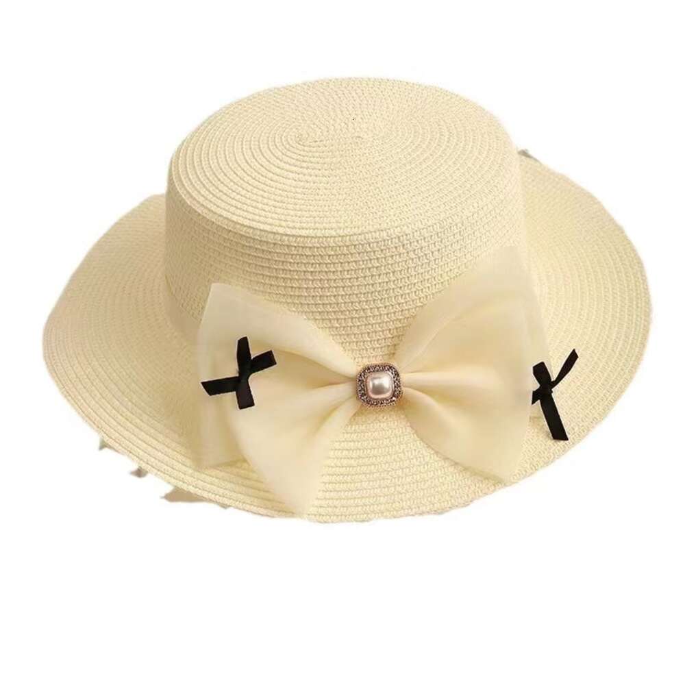 Chapeaux à large bord Chapeau de paille femmes parasol chapeau de paille style coréen perle arc plage vacances décontracté plage chapeau de protection solaire