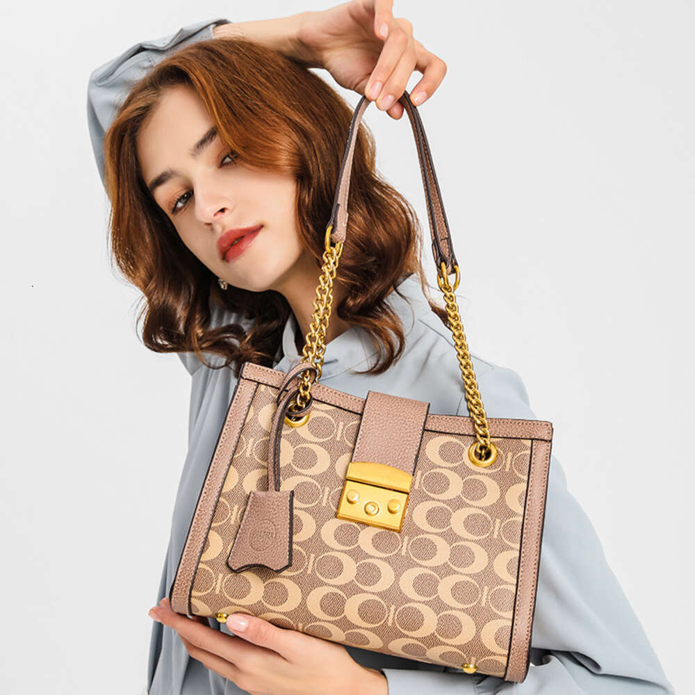 Borse eleganti dai migliori designer di texture leggera con texture di lusso stampato sacca alla moda e versatile una borsa a spalla con grande capacità le donne