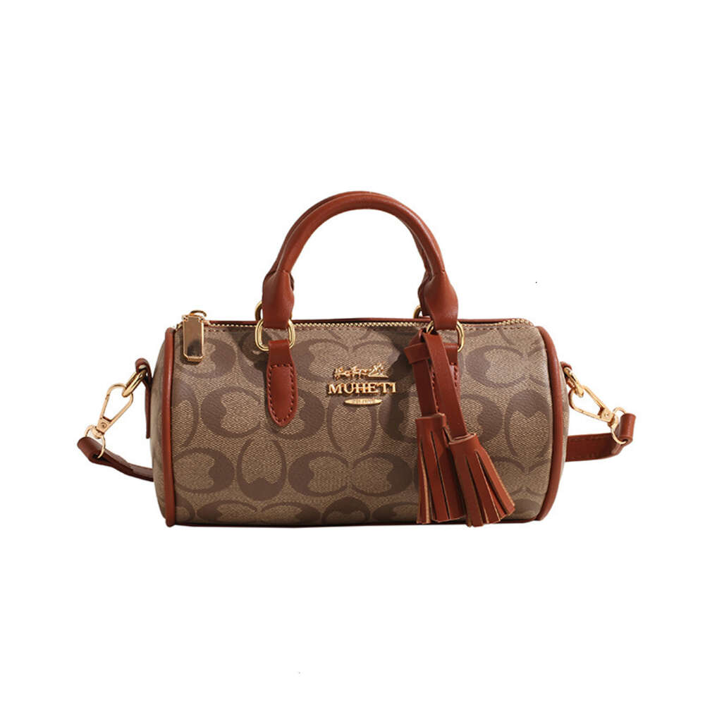 Snygga handväskor toppdesigners handväskor från designers tryckt cylinderbrun handväska metodväska med tofs trendiga pendling enkelt