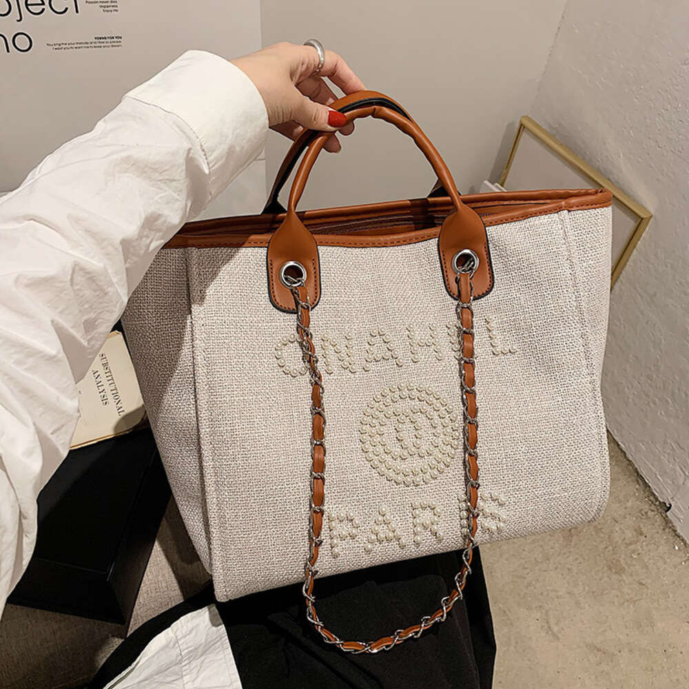 Borse alla moda dei migliori designer Beibei Shangpin Autunno/inverno Nuova borsa da spiaggia in tela con perle alla moda Volantino di mestolo Borsa a tracolla diagonale a spalla da donna