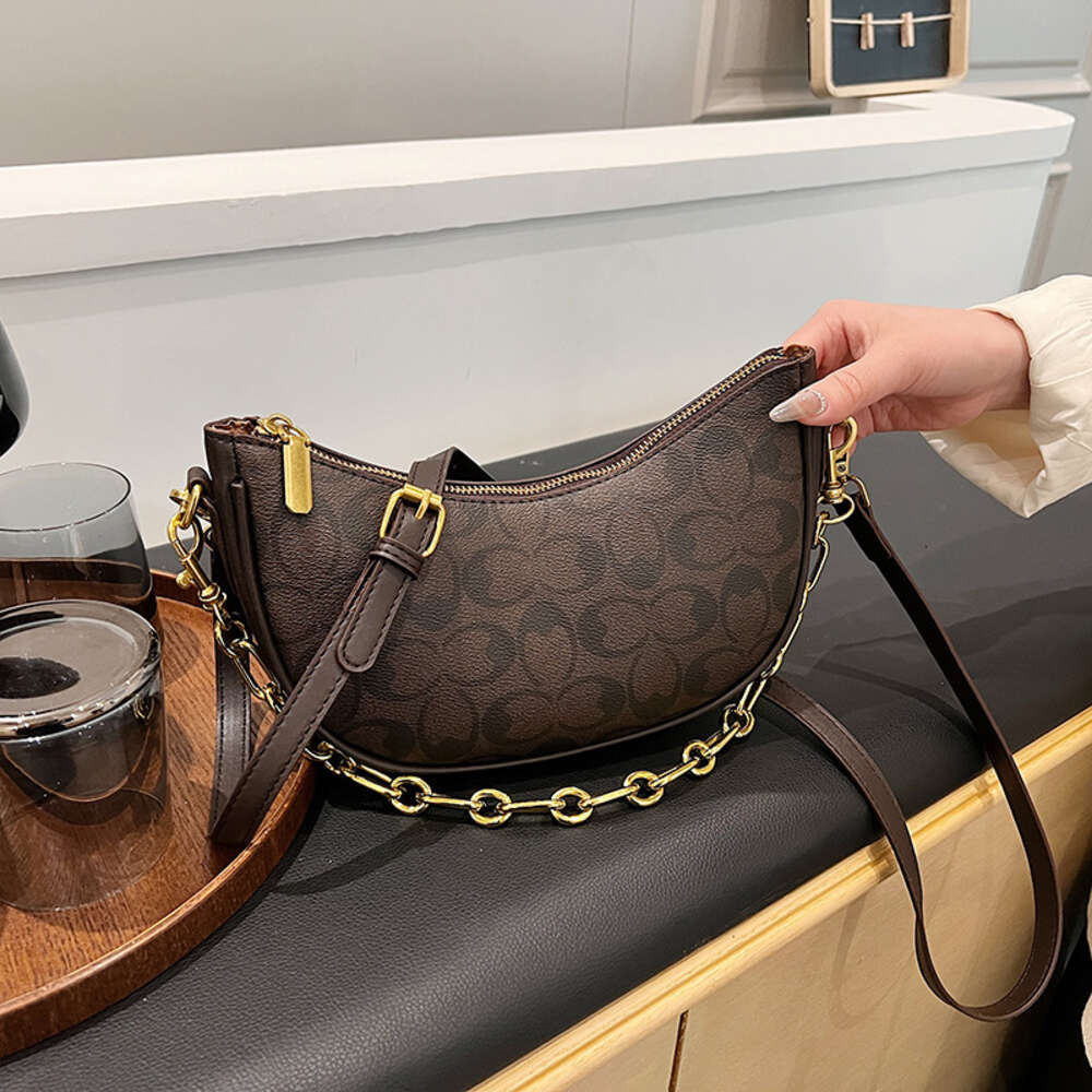 Liquidazione di fabbrica Nuova borsa dal design caldo Borsa da donna alla moda e squisita con tracolla a catena e borsa da donna sotto le ascelle