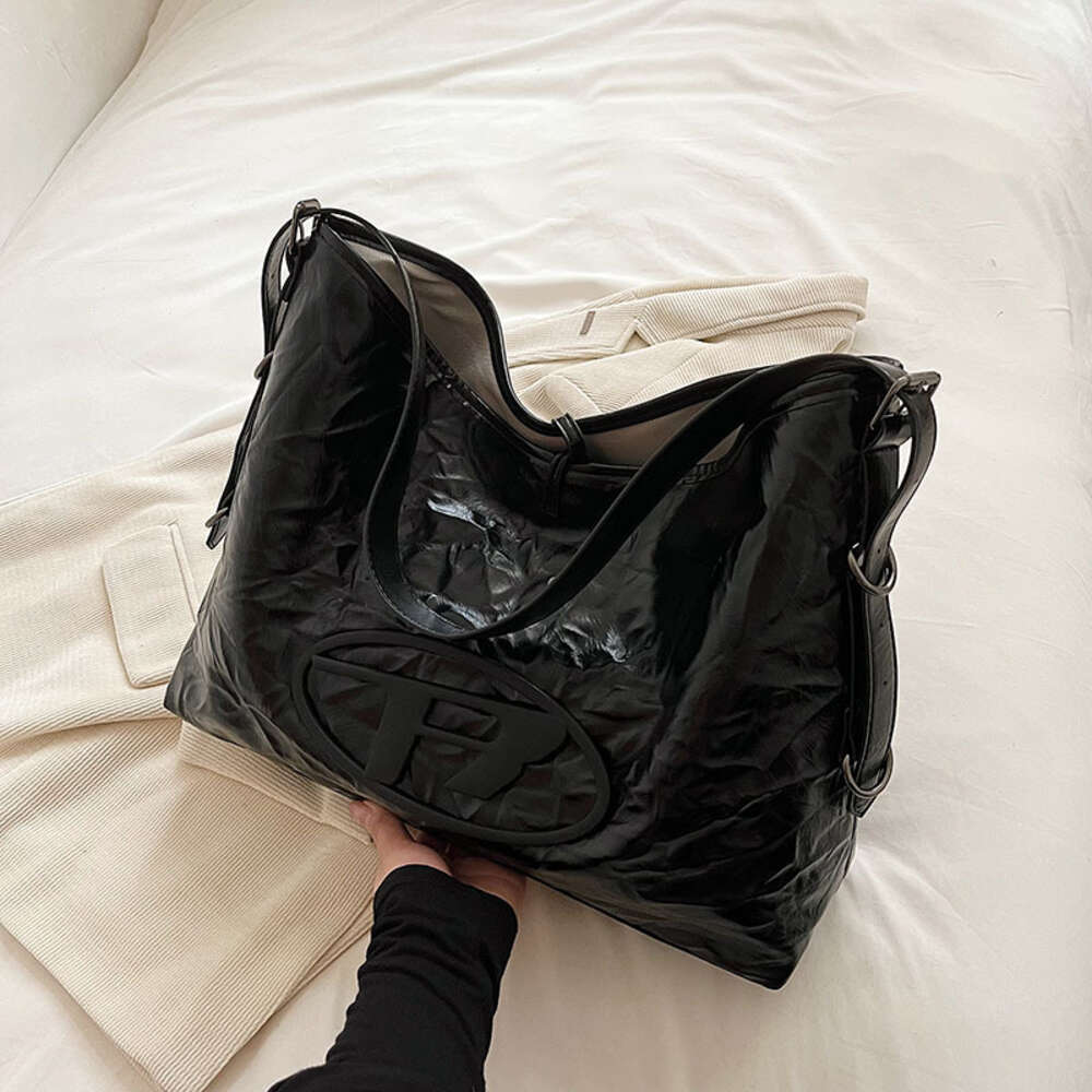 Sac à main de grande capacité pour femmes, vente en gros, bon marché, liquidation limitée, 50% de réduction, sac poubelle, nouveau fourre-tout Texture haut de gamme, chaîne errante