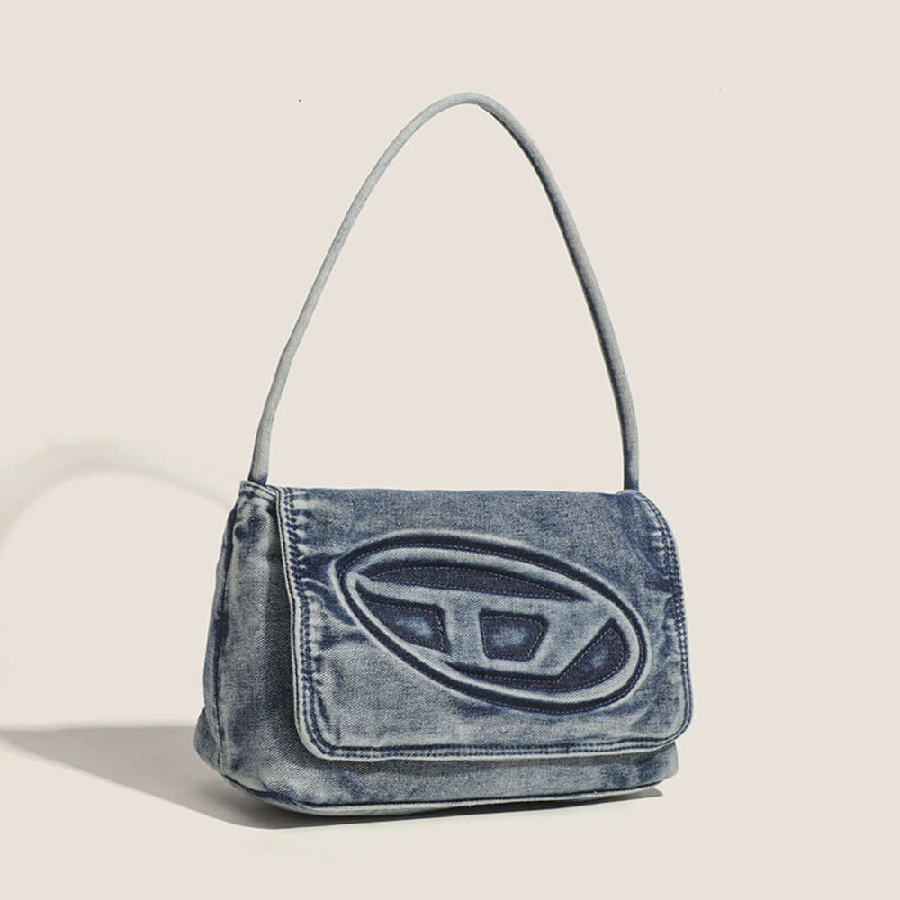 Pas cher en gros liquidation limitée 50% de réduction sac à main début automne nouveau luxe léger lavé denim doux et paresseux aisselles unique épaule bandoulière sac pour femme