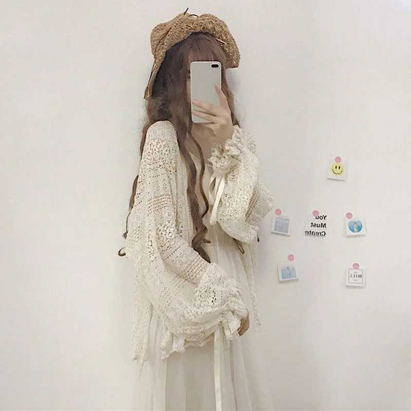 Women's Jackets Summer sweet thin sunscreen cardigan female Korean lace-up openwork blouse female holiday beach daily long sleeve blouseL2403