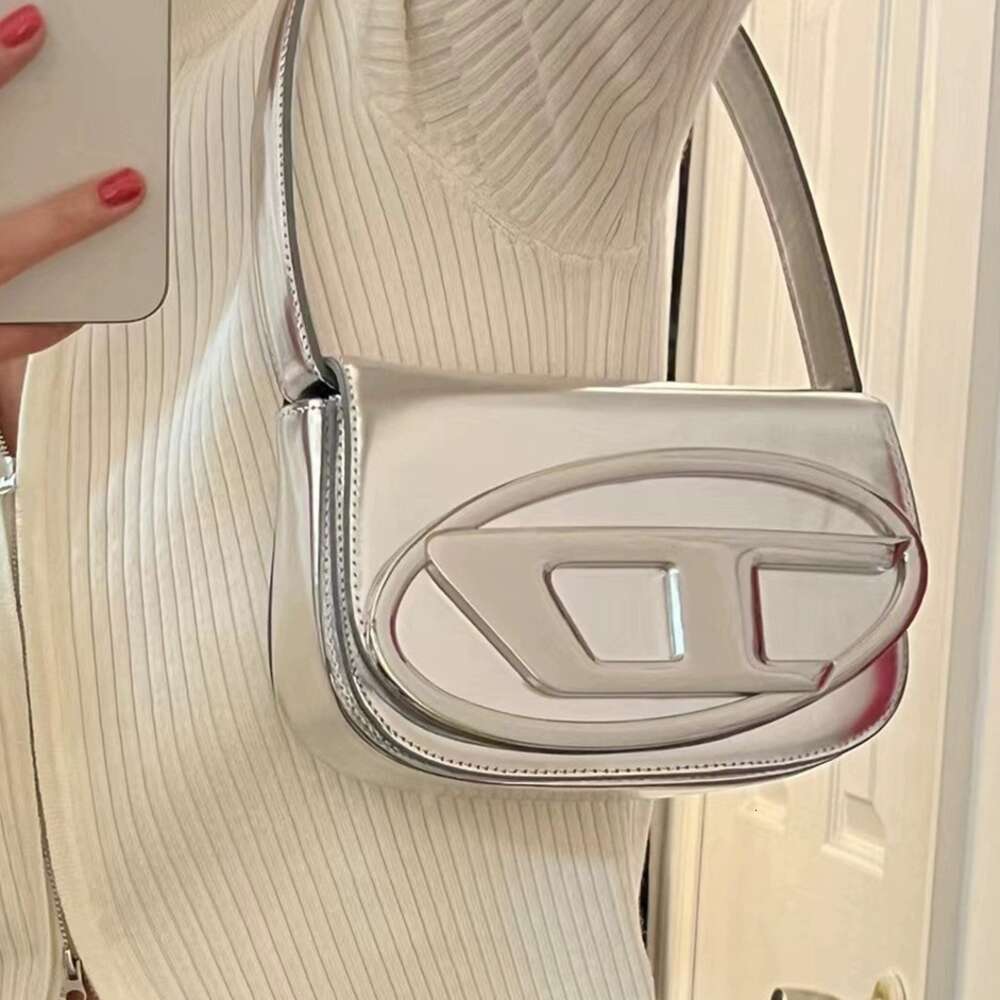 Pas cher en gros liquidation limitée 50% de réduction sac à main Niche Dign nouveau produit unique épaule sous les bras Ding sac à la mode fille Style Sier petit pour les femmes sacs à main