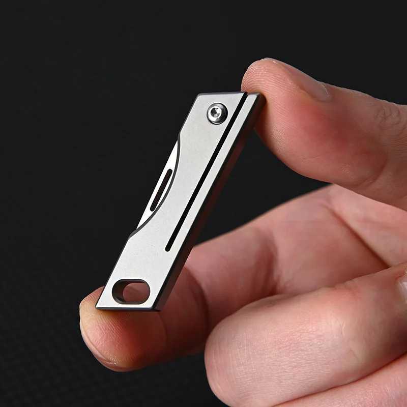 Tactical Knives New Titanium Alloy Mini Folding Knife High Hardness D2 Steel Sharp Knife Outdoor Portable Key Chain Pendant Unpacking KnifeL2403