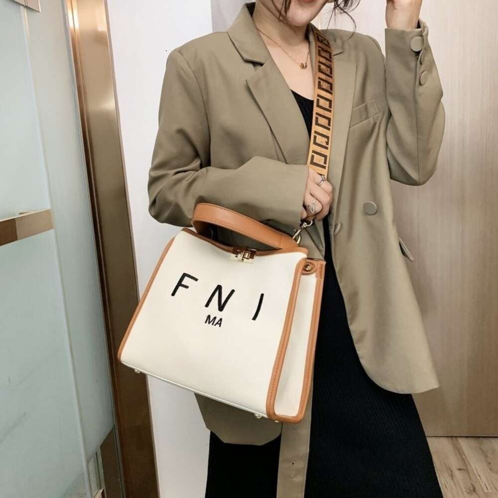 Desconto de fábrica de 50% em bolsas femininas de designer de marca promocional mesma bolsa de marca para mulheres estilo chinês nova moda carta leve luxo ombro portátil