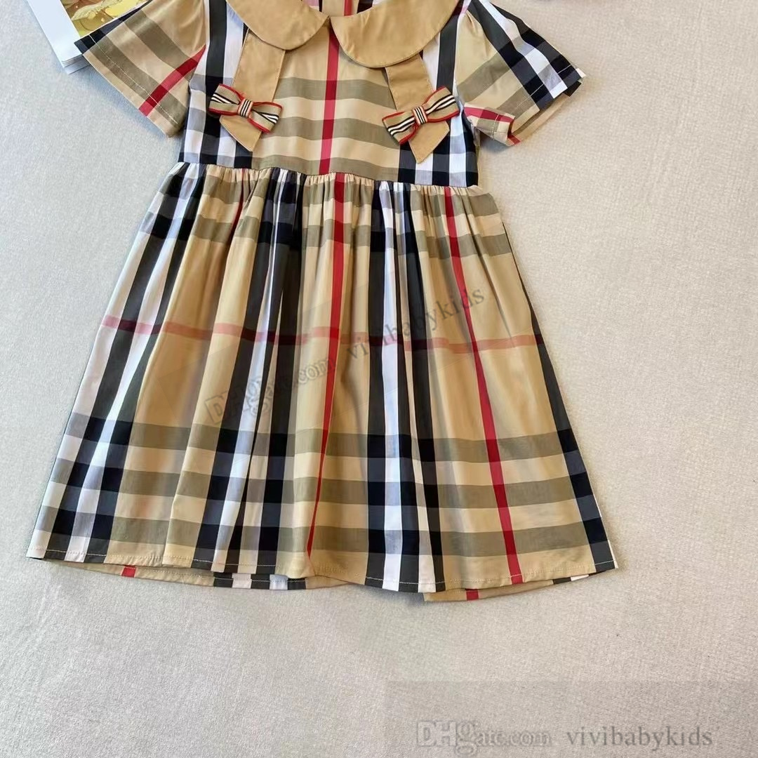 British Style Girls Plaid Dresses Summer Children Stripe Bow Lapel Short Sleeve Pleated Dress Preppy Style Kids Cotton Designer Clothes S1228