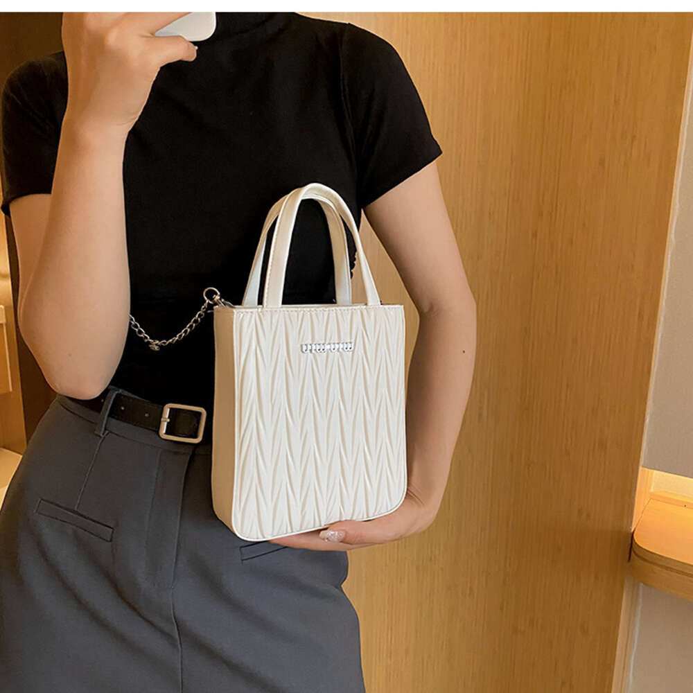 Billig grossistbegränsad clearance 50% rabatt handväska Denna populära lilla väska för kvinnor sommar mångsidig kedja crossbody fashionabla äkta läderhandväskor