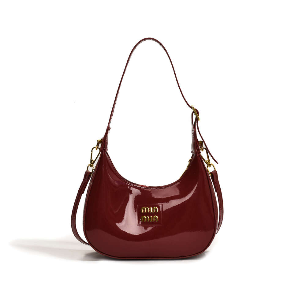 Borse di marca di moda all'ingrosso transfrontaliere Borsa a tracolla in pelle laccata le donne Crossbody ascellare pendolarismo High-end versatile lettera gnocco