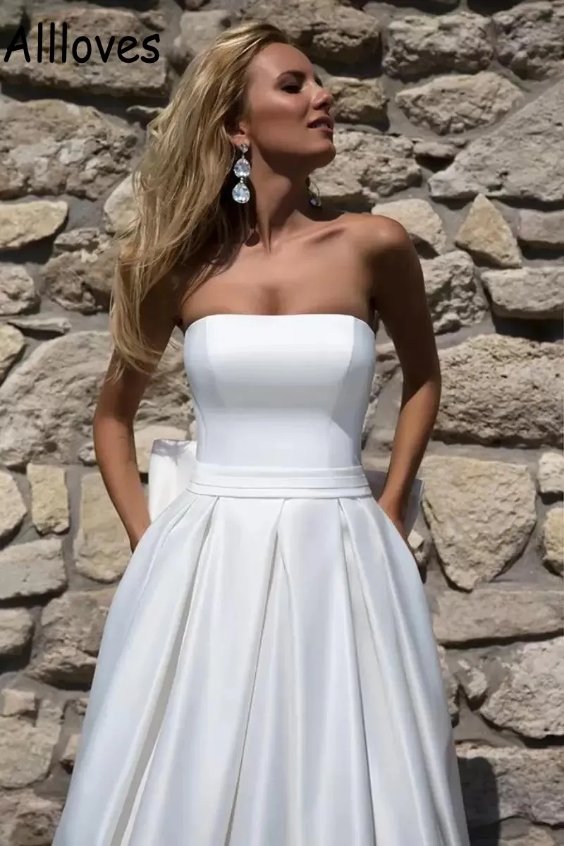 Trägerlose Satin-Empire-Brautkleider, sexy, offener Rücken, ärmellos, Boho-Garten-Brautkleider in A-Linie mit Schleife, bodenlang, moderne, einfache Strandroben von Mariee YD