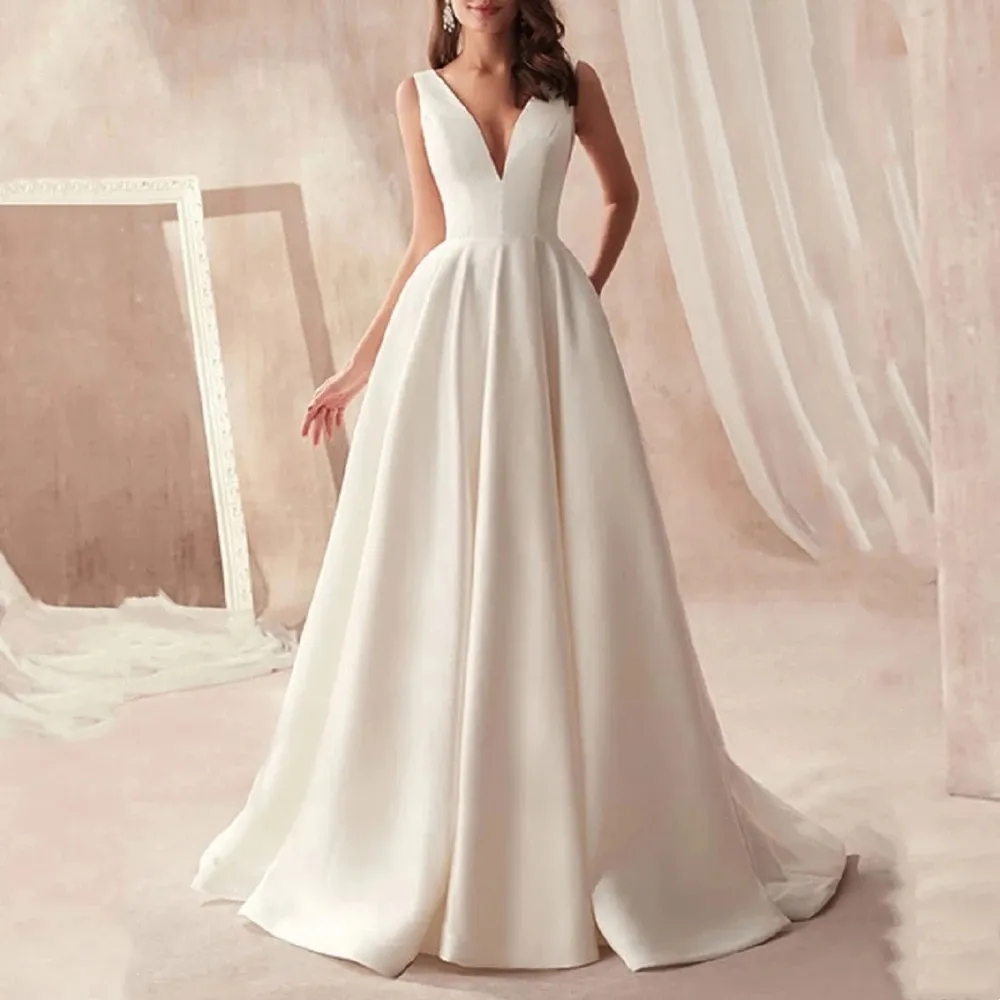 A Line Wedding Dresses Deep V Neck Sexy Sleeveless Boho Garden Bridal Gowns Open Back Sweep Train Reeption Dress For Bride Simple Robes YD