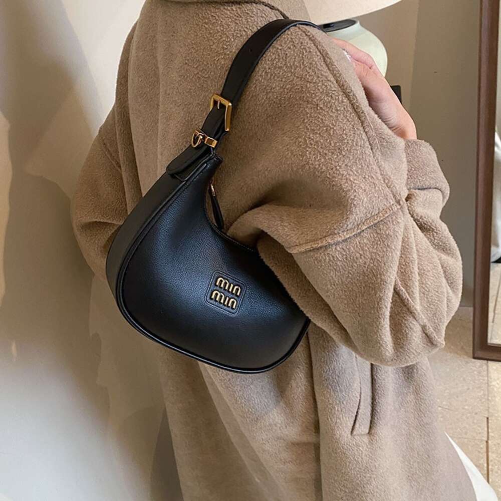 Goedkope Groothandel Beperkte Opruiming 50% Korting Handtas Lente Nieuw Minimalistisch voor Dames Niche Enkele Schouder Onderarmtas Zacht Leer Luxe Veelzijdige Crossbody