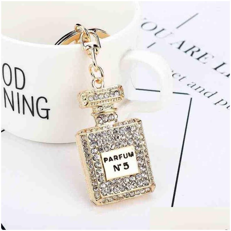 Keychains Lanyards Creative Fashion Rhinestone Keychain Bottle Key Chains Female Bag Car Pendant Line Up Birthday Gift T220909 Dro Dhfdy