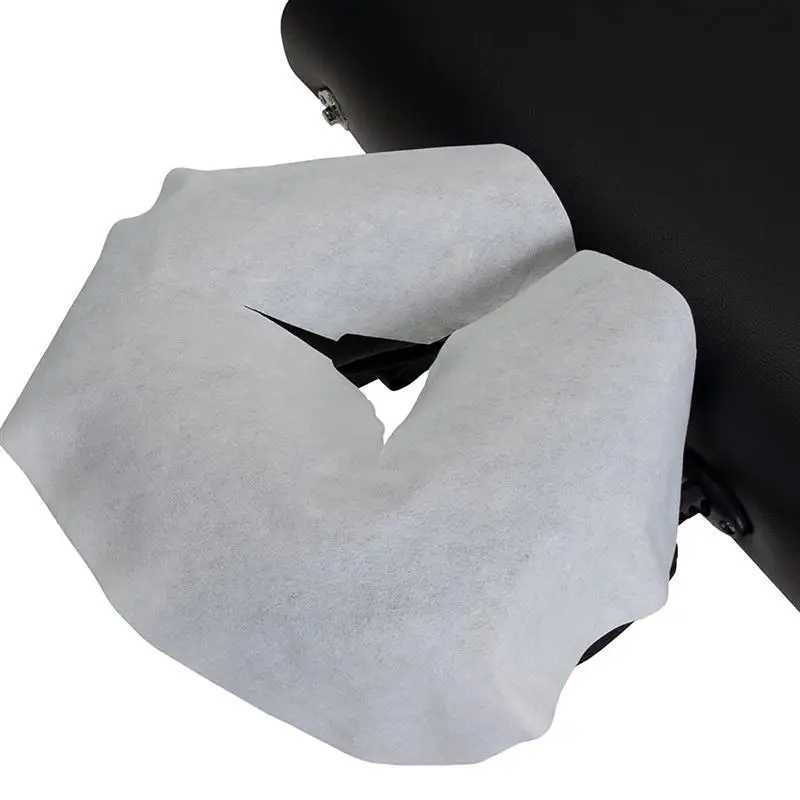 Visage Masseur 100 pièces de SPA coussin de massage du visage salon de beauté coussin de tête de massage jetable non-tissé oreiller serviette couverture outil de soins de la peau du visage 240321