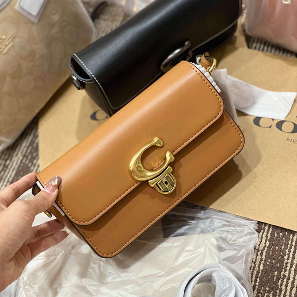 Counter High Quality Luxury Explosive Shoulder Fashion Bag New Womens Lacquer Leather Stick Bag Studio Baguette Small Square Single Shoulder Crossbody Bag