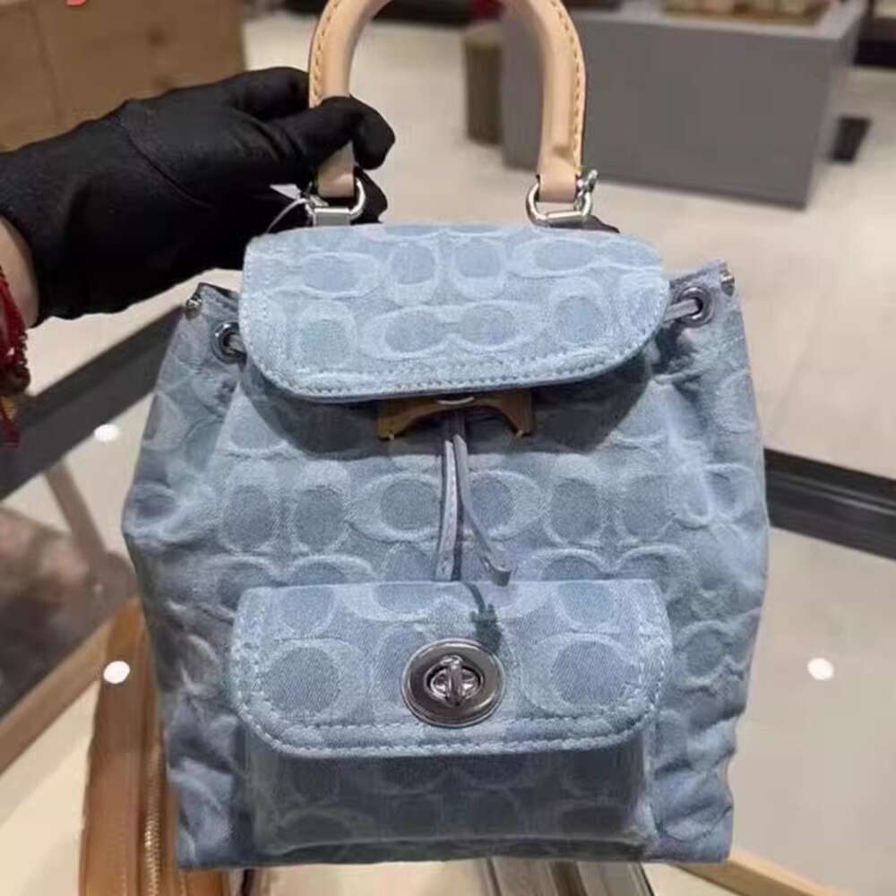 Counter Hochwertige Luxus-Explosive-Schulter-Modetasche aus echtem Leder für Damen aus Denim-Stoff. Neue süße kleine Rindsleder-Rucksack-Tasche