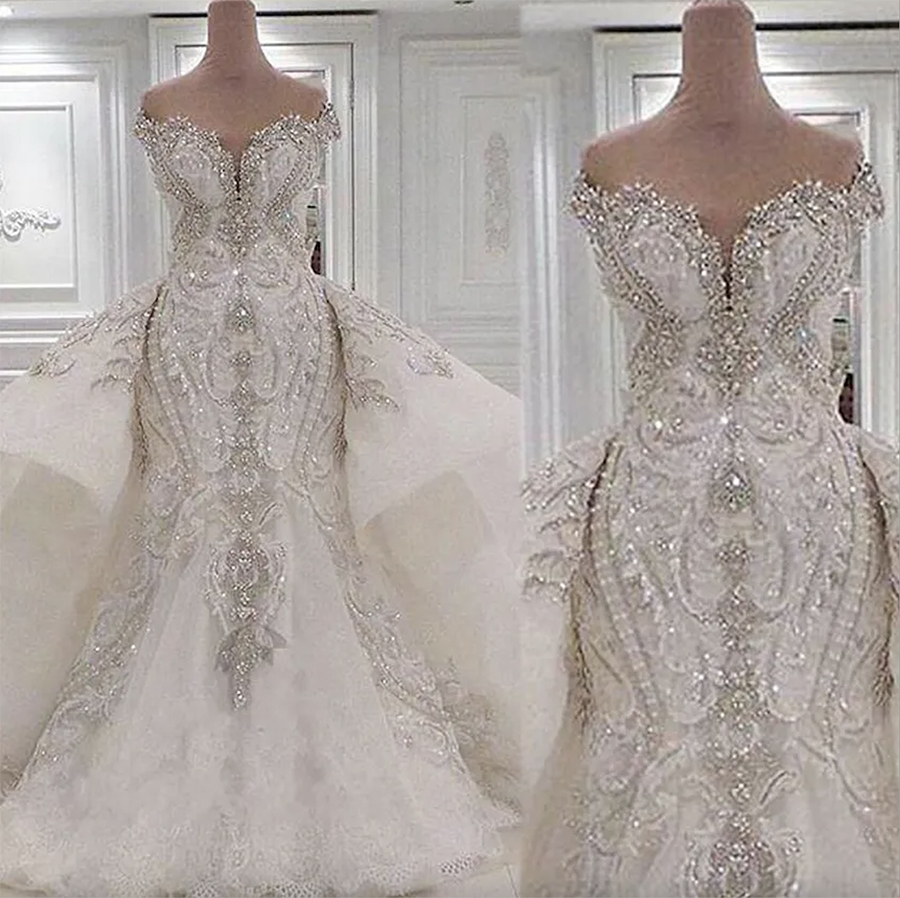 2024 Abiti da sposa di lusso in cristallo di sirena con gonne oversize in pizzo con volant e strass Abiti da sposa Dubai Abiti da sposa su misura