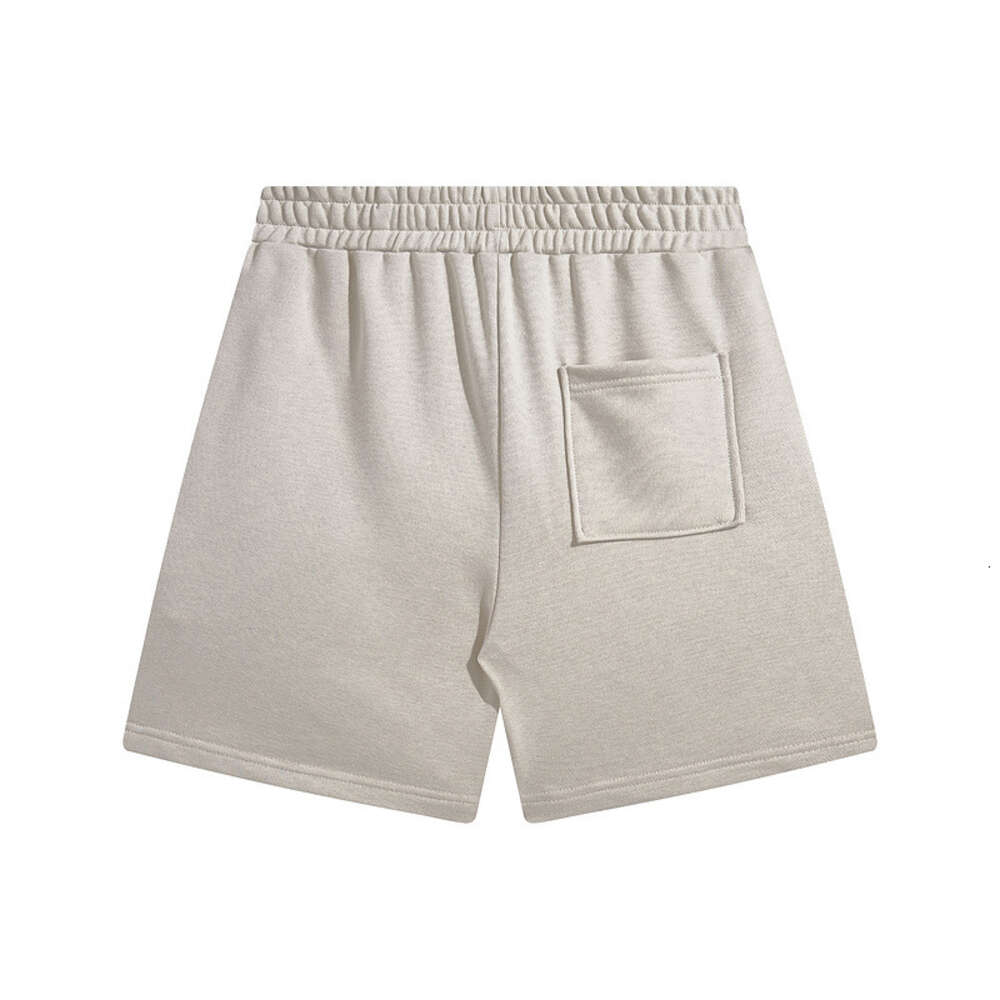 Petite marque tendance représentant la tenue d'été, nouveau short ange ample américain, Capris en pur coton pour hommes