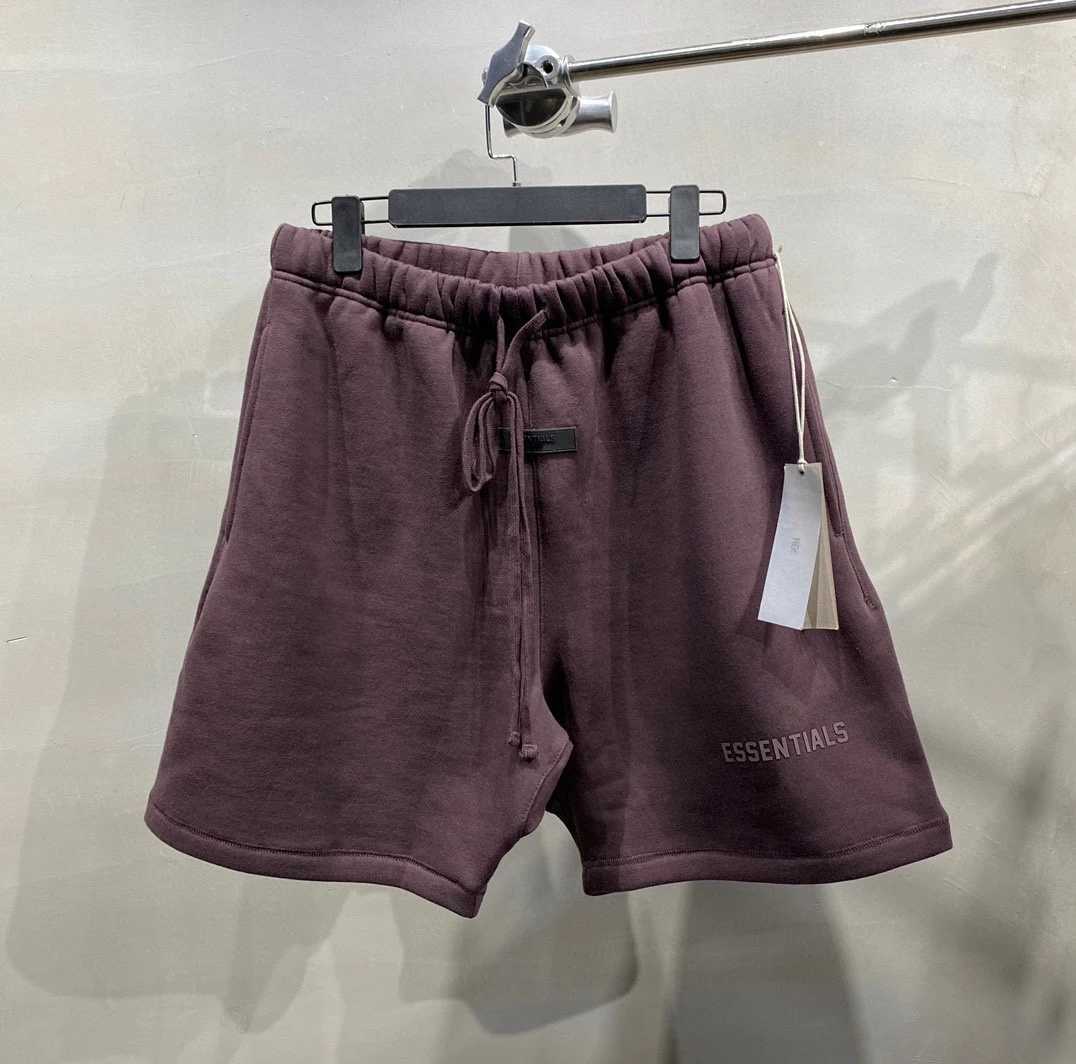 Shorts pour hommes Un nouveau short en caoutchouc coloré incontournable pour l'été 2023, vêtements d'extérieur de haute qualité, shorts brossés, vêtements de rue à la mode pour hommes 24323