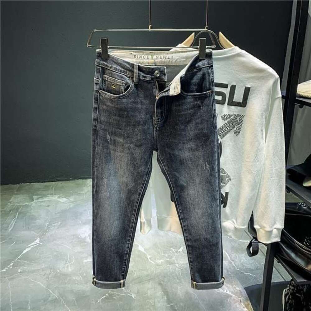 Jeans de créateur Nouveaux jeans haut de gamme pour hommes Pantalons à petites jambes extensibles coréens pour hommes Pantalons courts amincissants décontractés et polyvalents pour hommes