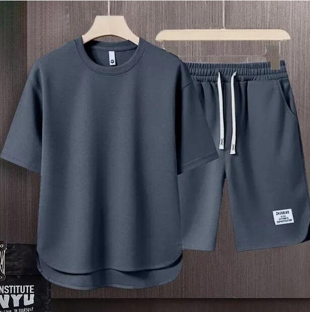 Mens Korean Fashion Waffle Two Piece Set Summer Short Sleeved T-shirt och Shorts Loose Sets Men Designer Kläderspårspår