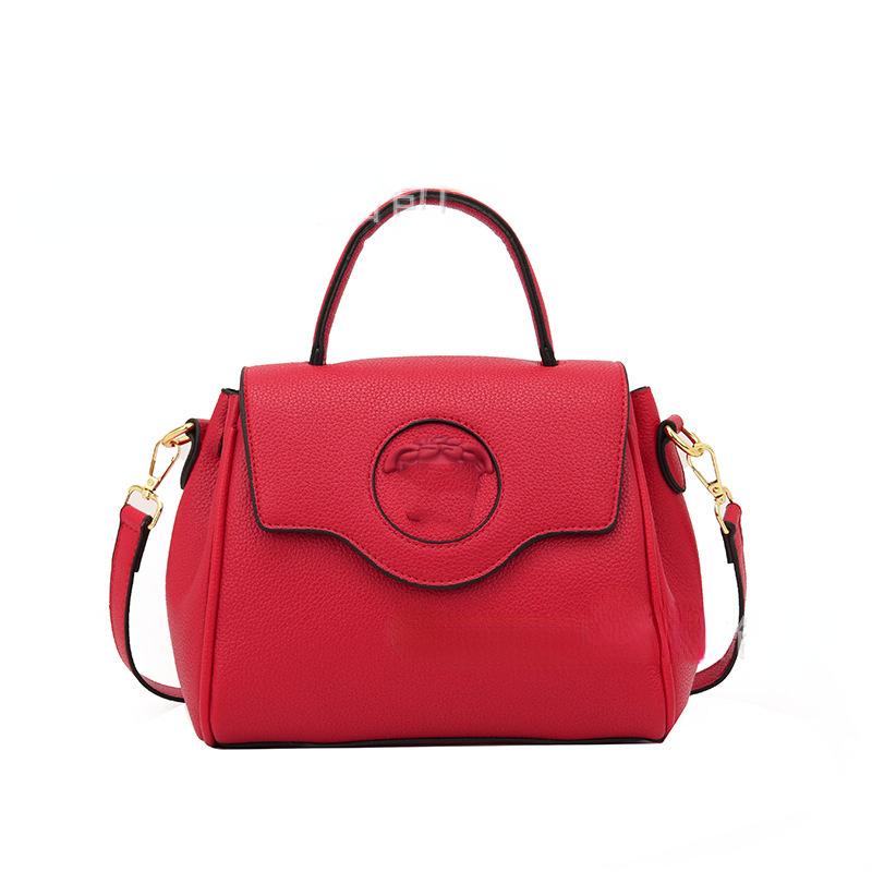 Kvinnors designersäckar 2023 Ny väska fast färg stor kapacitet handväska pu mode kväll väska